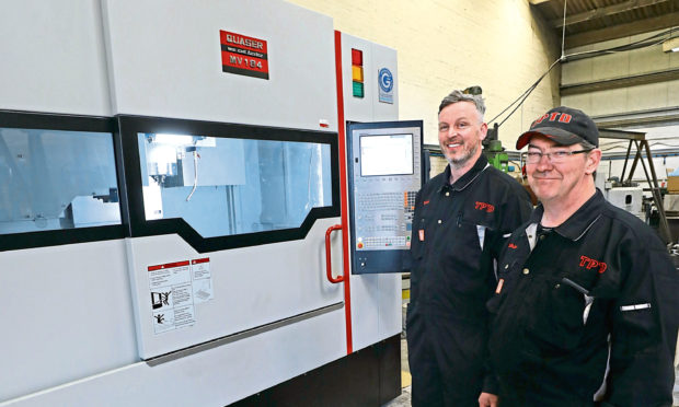 Grant Armstrong and John Welsh of Tayside Precision Tools with their new milling machine.