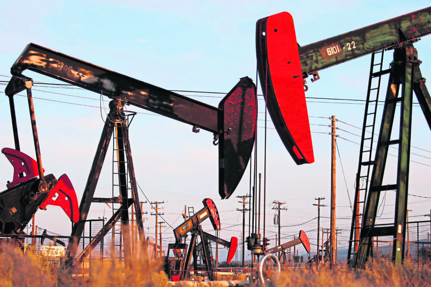 Black Gold: Pump jacks and wells at work above a shale formation in California