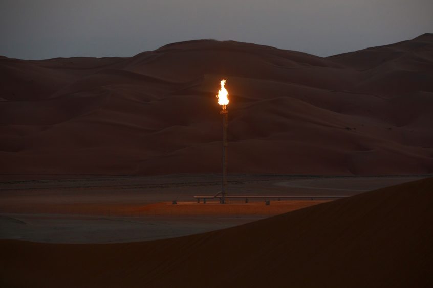 Flames burn off at an oil processing facility in Saudi Aramco's oilfield in the Rub' Al-Khali (Empty Quarter) desert in Shaybah, Saudi Arabia, on Tuesday, Oct. 2, 2018.  Photographer: Simon Dawson/Bloomberg