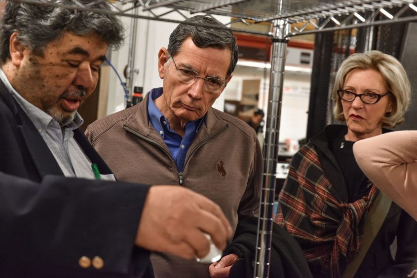 Mohammed Imbabi from CCM explains the science behind the company's work to members of the U.S. Senate delegation