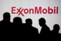President Trump's call for a $25mn campaign contribution from Exxon was hypothetical, the company has clarified in a rare tweet.