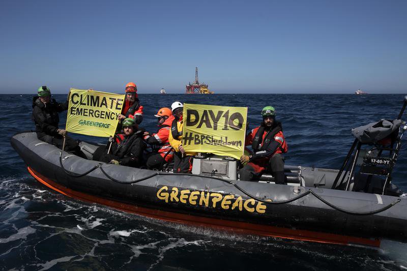 Greenpeace protestors in the North Sea with Transocean Paul B Loyd Jr in the background