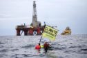 Greenpeace demanding that Big oil accelerate the enegry Transition from the North Sea