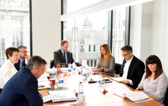P&J Gold Awards judging session.
Pictured - clockwise from front left - Luca Corradi, Brenda Wyllie, Alan Dick, Mark Lammey, Jodie MacLeod, Paul White and Tracy Clark.
