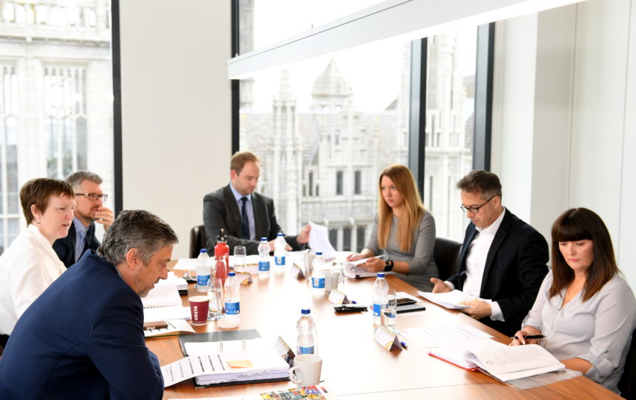 P&J Gold Awards judging session.   
Pictured - clockwise from front left - Luca Corradi, Brenda Wyllie, Alan Dick, Mark Lammey, Jodie MacLeod, Paul White and Tracy Clark.