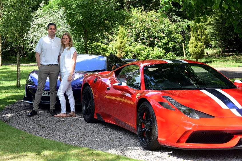 Ross Gatt and wife Candice organise the annual SuperCLAN event. Pictured with a Ferrari 458 Speciale and a McLaren 600LT.
Picture by Jim Irvine.