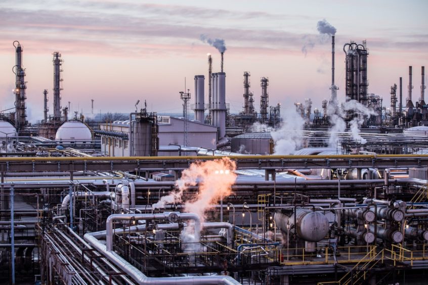 Oil processing and refining structures stand in the Duna oil refinery, operated by MOL Hungarian Oil & Gas Plc, in Szazhalombatta, Hungary, on Wednesday, February 13, 2019.