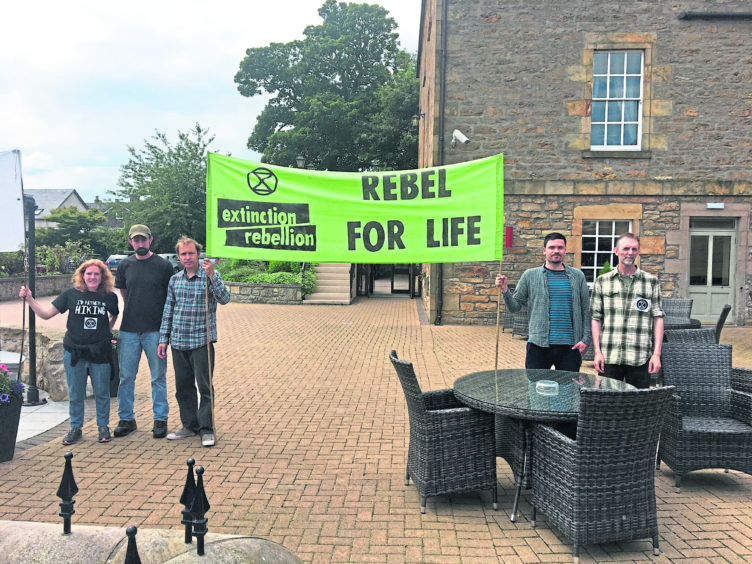 Extinction rebellion protestors outside the Mansfield Hotel where BP were attending a Highlands and Islands energy meeting.
Picture by David Walker 16/07/19