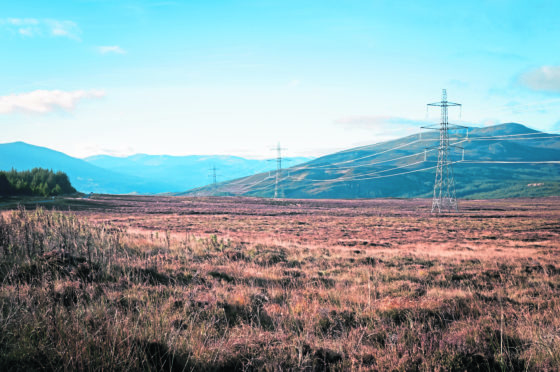 Pylons and Power Cables strewn across the Scottish Landscape.