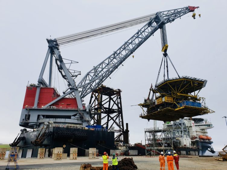 The ST-1 topside and jacket being delivered to Dales Voe in Shetland.