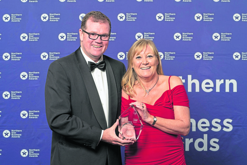 Pictured left to right is Rob Wicks (Aberdeen Football Club) and Zoe Ogilvie (Big Partnership) recieving the Marketing Magic Award at the Northern Star Business Awards 2018 at the AECC 

Picture by Euan Duff / Abermedia