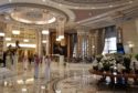 Participants walk through the foyer of the Ritz Carlton Hotel during preparations ahead of the Future Investment Initiative (FII) conference in Riyadh, Saudi Arabia, on Monday, Oct. 22, 2018. Saudi Arabia planned to announce a raft of deals in energy and base metals at its signature investment forum even as it struggled to overcome international outrage over the killing of a government critic.Photographer: Javier Blas/Bloomberg