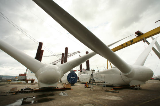 Partially constructed wind turbine blades are stored at the Harland & Wolff shipyard on August 14, 2008 in Belfast, Northern Ireland. (Photo by Peter Macdiarmid/Getty Images)