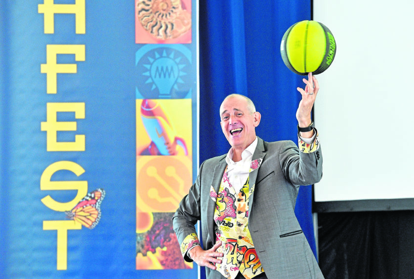 Pictured is Dr Ken performing his show.
Sneak-peak at new Tech-Fest show Entertaining Circus Science Show, with demonstrations in chemistry of fire eating, circus whip sound barrier and physics of juggling while unicycling. 
Picture by DARRELL BENNS    
Pictured on 23/08/2019
CR0013307