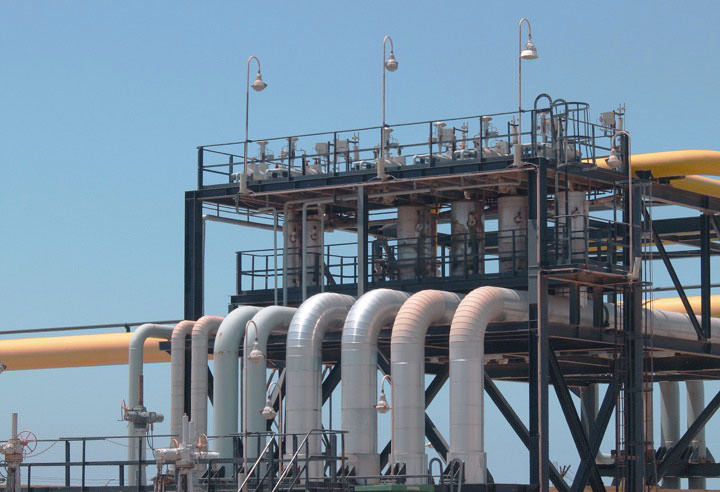 Pipes and equipment on a blue sky