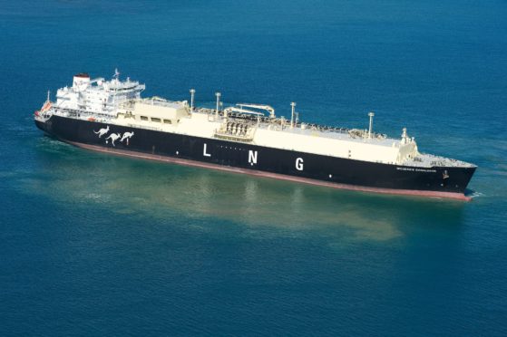 An LNG carrier carries supplies from Pluto LNG