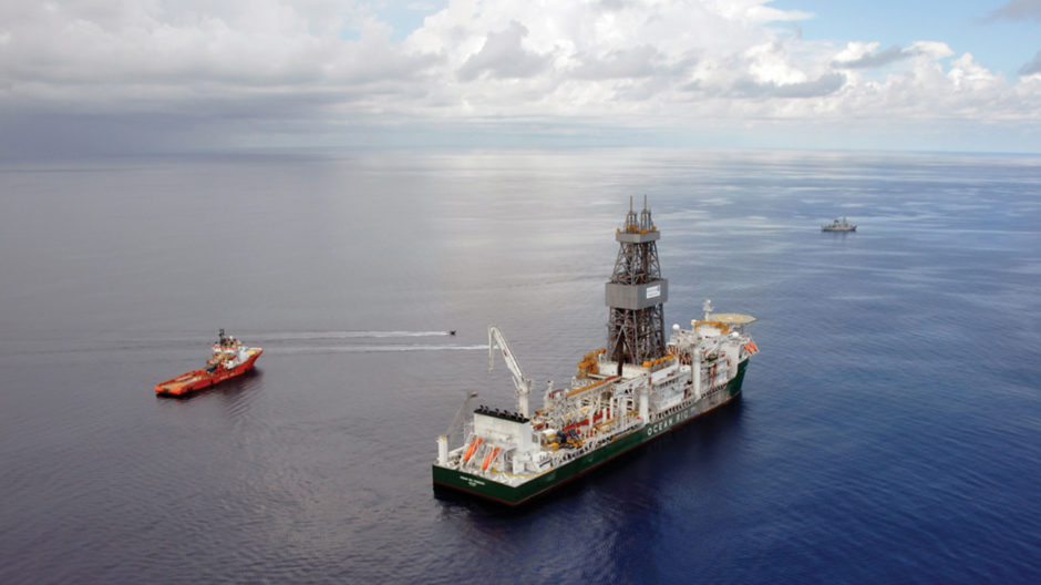 A drilling rig with a support vessel