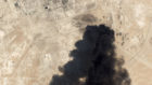 This Saturday, Sept. 14, 2019, satellite image from Planet Labs Inc. shows thick black smoke rising from Saudi Aramco's Abqaiq oil processing facility in Buqyaq, Saudi Arabia. Yemen's Houthi rebels launched drone attacks on the world's largest oil processing facility in Saudi Arabia and a major oil field Saturday, sparking huge fires and halting about half of the supplies from the world's largest exporter of oil. (Planet Labs Inc via AP)