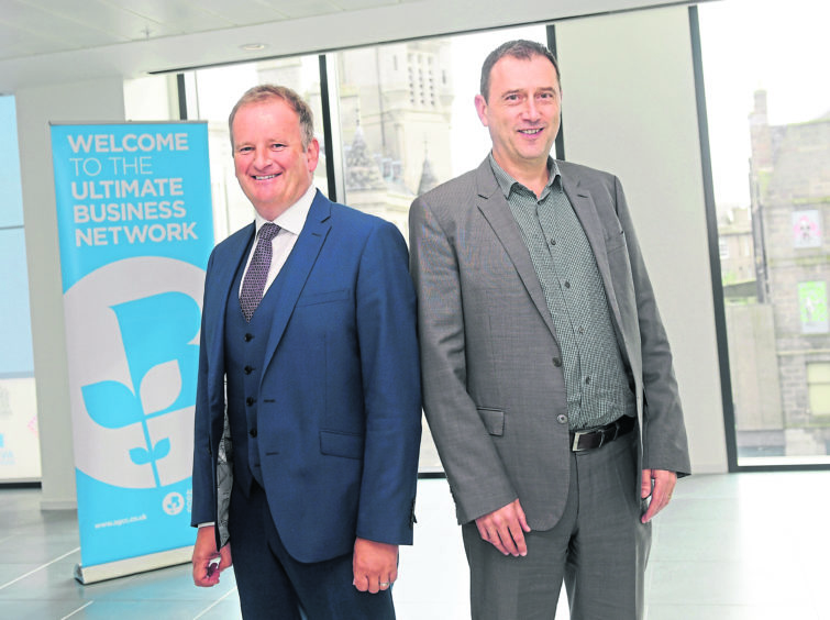 From left, Derek Leith, senior partner at EY and Chamber chief executive Russell Borthwick.