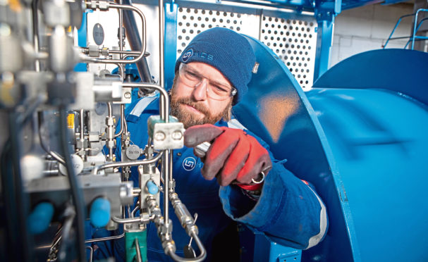 HCS Control Systems. Dean Fearn at work on one of the company's latest offshore projects within its Inverurie factory.