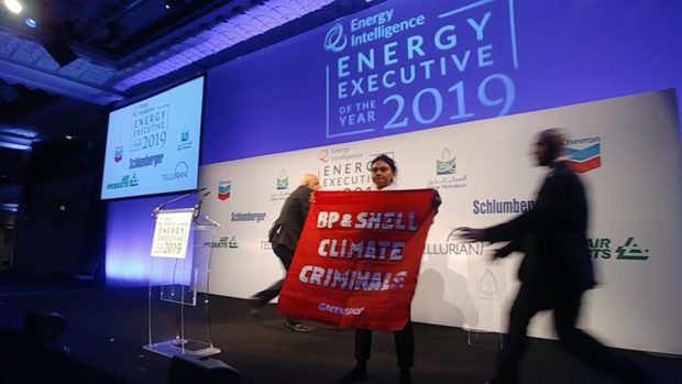 Greenpeace activists took to the stage at the Oil and Money conference last night
