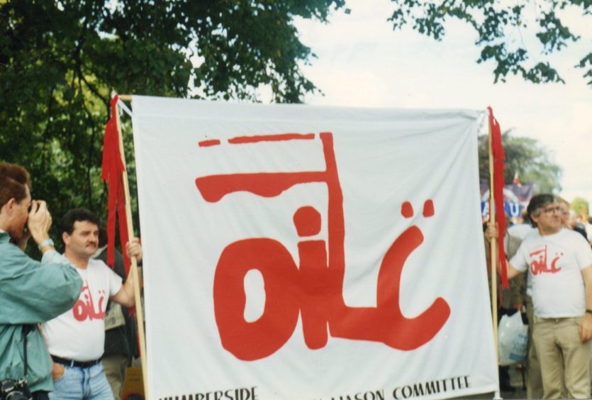 Oilc was formed in 1989. The logo is inspired by the “Solidarnosc” trade union movement in Poland.