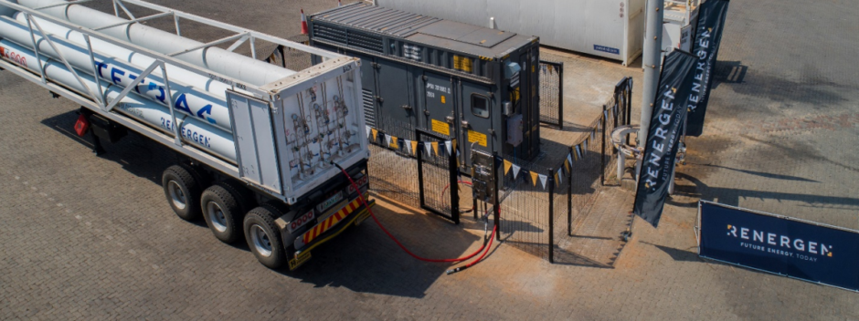 Truck parked next to industrial equipment for refuelling