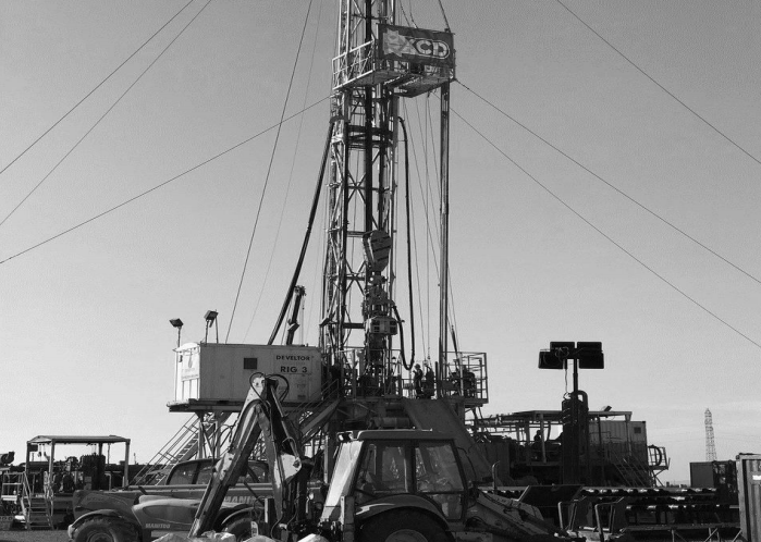 Rig silhouetted against sky