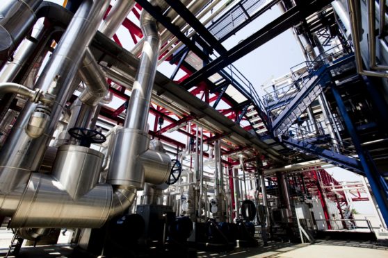 The world's first industrial-scale hydrogen plant, owned by Enel SpA, operates in Fusina, near Venice, Italy, on Monday, July 12, 2010. Enel over the next five years plans to spend 7.4 billion euros on research and construction of hydrogen plants, wind farms, solar power, and other technologies that are cleaner than its coal, gas and oil-fueled plants. Photographer: Alessandra Benedetti/Bloomberg