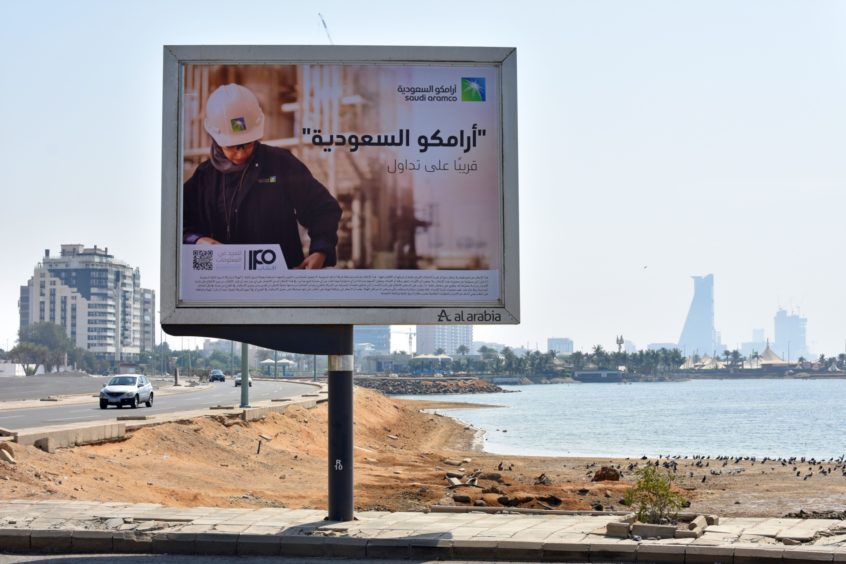 An advertisement advertising the planned Saudi Aramco initial public offering (IPO) sits on display at the Corniche coastline in Jeddah, Saudi Arabia, on Friday, Nov. 8, 2019. Saudi Arabias Crown Prince Mohammed Bin Salman may have lowered his valuation-target for Saudi Aramco as it prepares an initial public offering, but some of the worlds biggest investors say hes not gone far enough. Photographer: Rodney Jefferson/Bloomberg