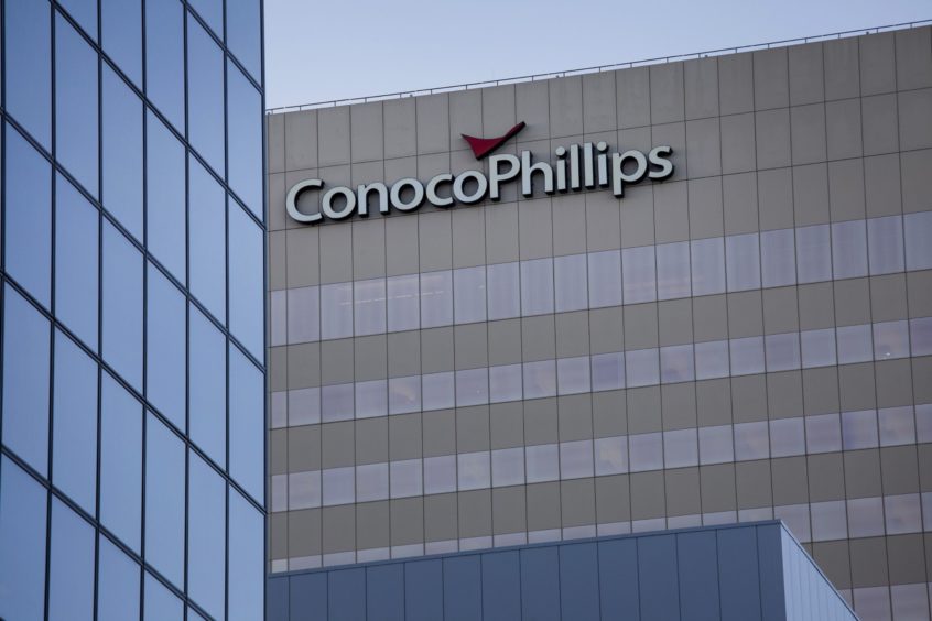 ConocoPhillips cut debt