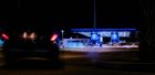 Adnoc fuel station lit up at night