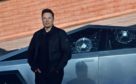 Tesla co-founder and CEO Elon Musk stands in front of the shattered windows of the newly unveiled all-electric battery-powered Tesla's Cybertruck at Tesla Design Center in Hawthorne, California on November 21, 2019. (Photo by FREDERIC J. BROWN / AFP) (Photo by FREDERIC J. BROWN/AFP via Getty Images)