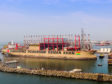 A power ship moored in a harbour.