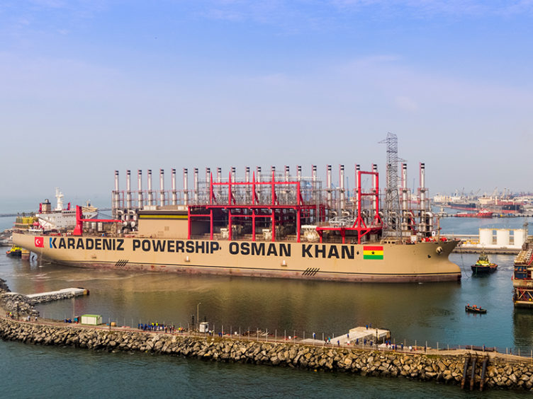 A power ship moored in a harbour.