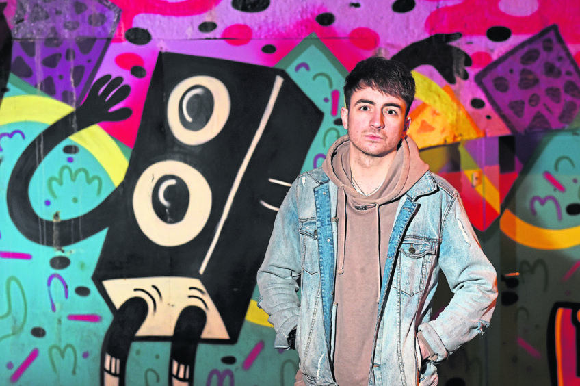 Nick Cronin, an oil and gas office worker, is aiming to make it big as a music producer.