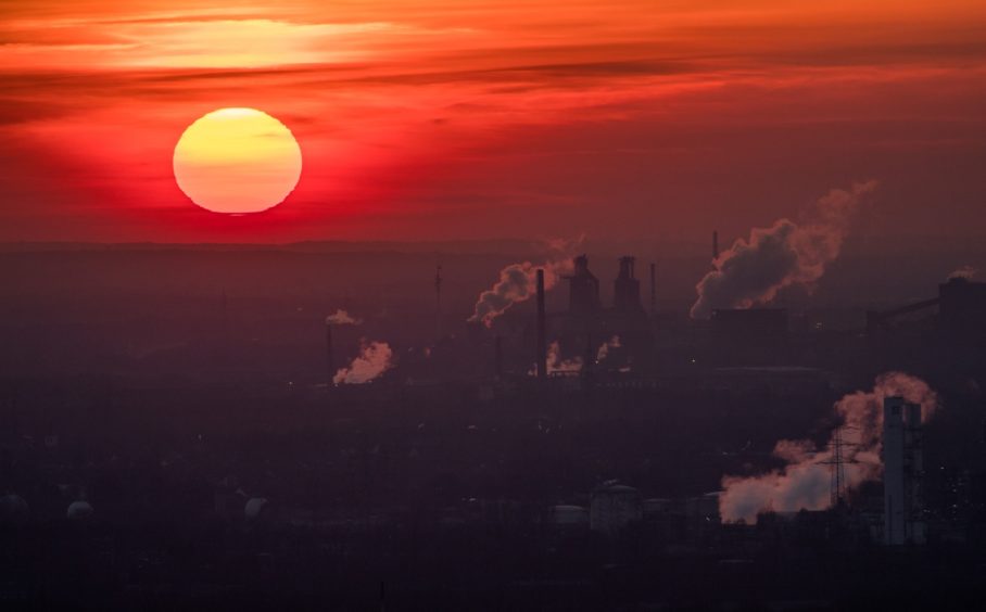 Steam and exhaust rise from different companies on a cold winter day on January 6, 2017 in Oberhausen, Germany.