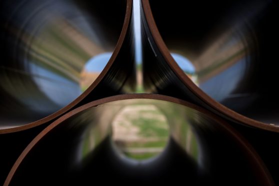 Sections of pipe sit stacked on the European Gas Pipeline Link (EUGAL) site, a joint construction project by Sicim SpA and Bohlen & Doyen Bauunternehmung GmbH, in Gellmersdorf, Germany, on Tuesday, May 29, 2019. One of Europe's biggestnatural gasusers has turned decidedly pessimistic on the fuel, prompting traders to rethink their own outlook for the industry. Photographer: Krisztian Bocsi/Bloomberg