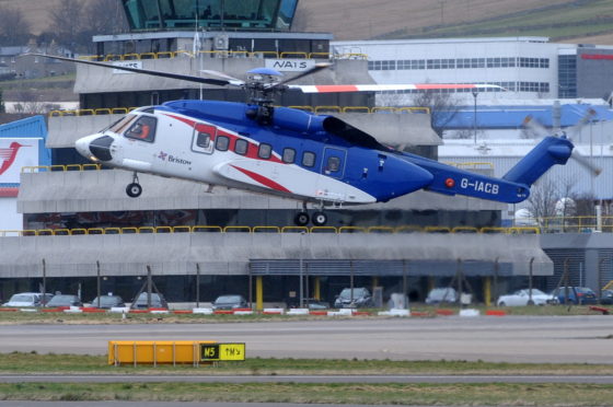 A Bristow S-92 helicopter taking off from its North Sea base in Aberdeen.