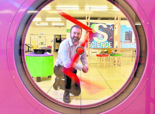 CR0018456
Pictured is Bryan Snelling, New Chief Executive of Aberdeen Science Centre. Pictured through a Rott's Pendulum.
Picture by Scott Baxter 17/01/2020
