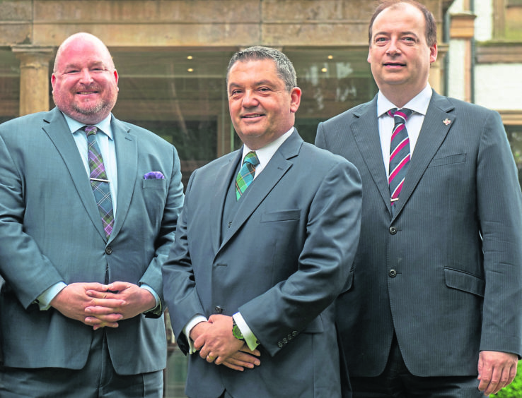 TEAM: From left, Jeffrey Blair, Andy Grieve and Brett Jackson.