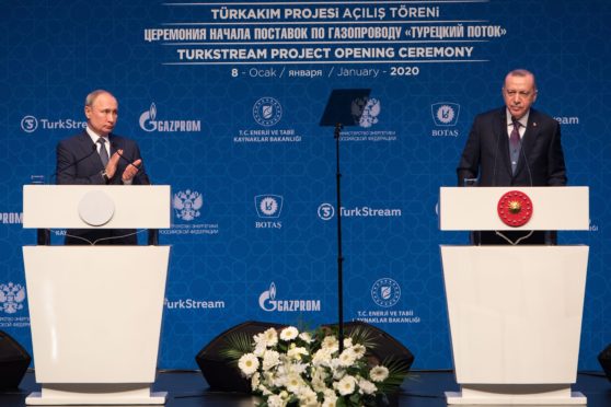 Recep Tayyip Erdogan, President of Republic of Turkey, and Vladamir Putin, President of Russian Federation,gives a speech at TurkStream opening ceremony at Halic Congress Center in Istanbul,Turkey on Wednesday,Oct 07 , 2020.Photographer: Kerem Uzel/Bloomberg