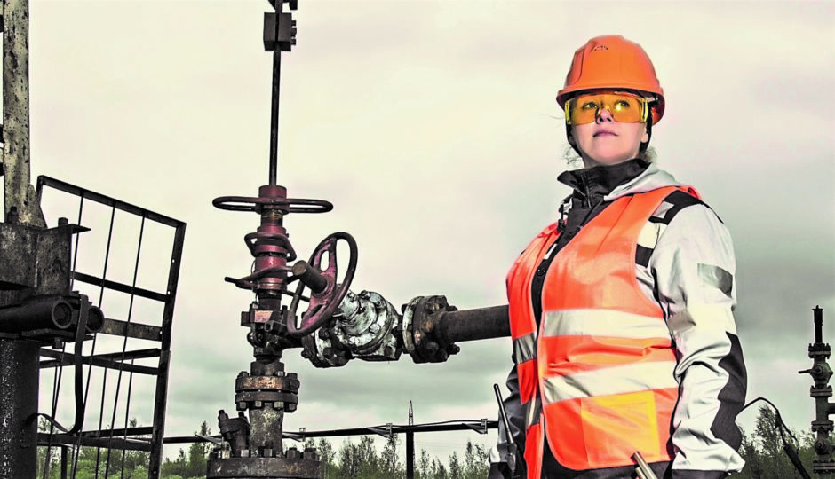 Woman engineer in the oil and gas sector.