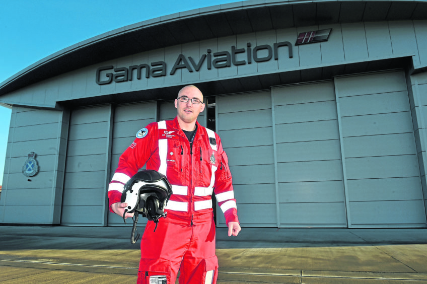 Ewan Littlejohn, who has been appointed lead paramedic with the Aberdeen-based SCAA helimed. He is at his current place of work, Gamma hangar Aberdeen airport, Dyce
the base of the ambulance service's fixed wing plane at the airport.
Picture by COLIN RENNIE   January 20, 2020.