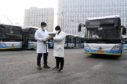 Staff members record the disinfecting log at a bus station in Beijing
Coronavirus outbreak, China - 27 Jan 2020
Photo by CHINE NOUVELLE/SIPA/REX/Shutterstock (10540390b)