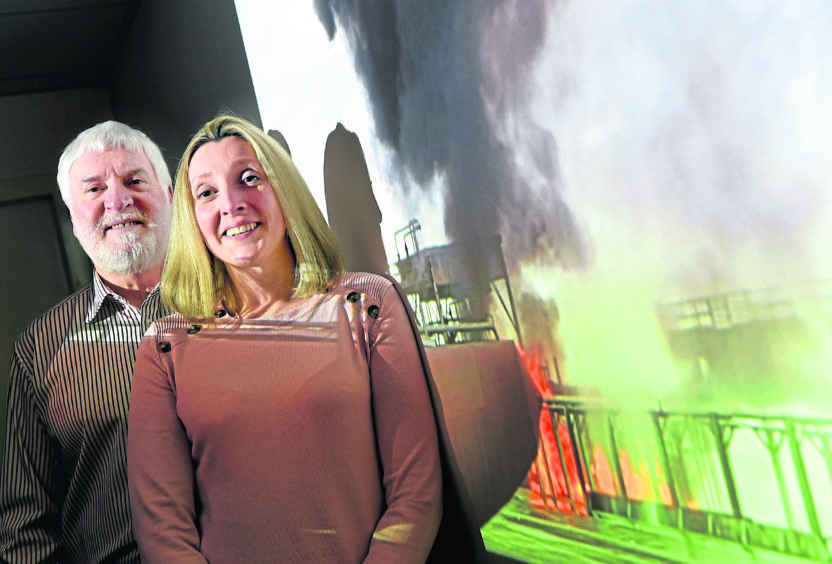 Claire Forbes with her father Mike Forbes.