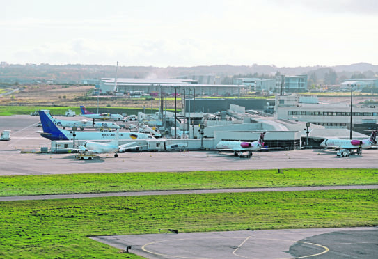 Loganair operated planes at Aberdeen International Airport.