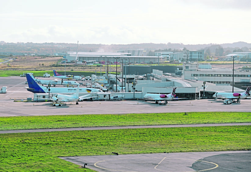 Loganair operated planes at Aberdeen International Airport.