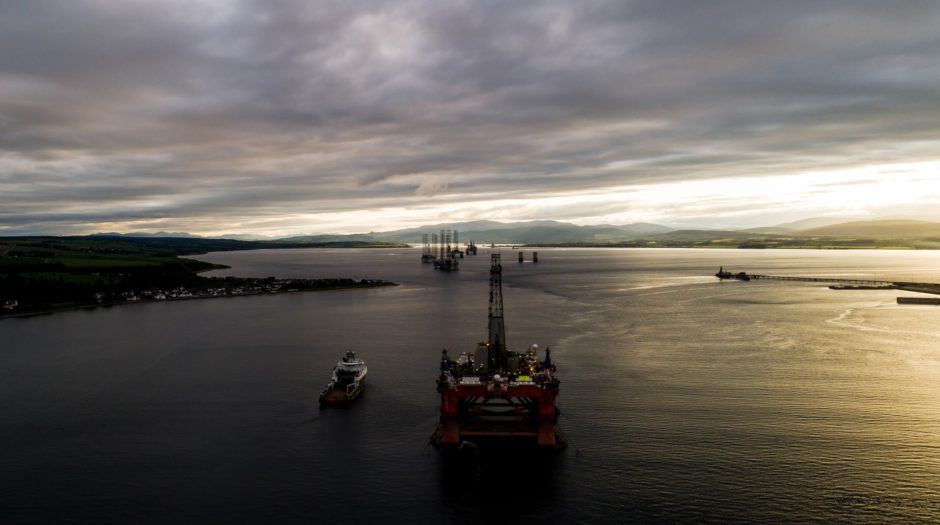 Greenpeace climbers are on a BP oil rig in Cromarty Firth,