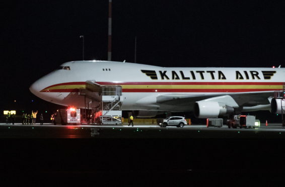 Mandatory Credit: Photo by Canadian Press/REX/Shutterstock (10550733g)
A Kalitta Air plane chartered by the United States government carrying U.S. and Canadian citizens home from Wuhan, China, arrives at Vancouver International Airport in Richmond, B.C. to refuel before continuing on to a U.S. Air Force Base
Coronavirus outbreak, Richmond, Canada - 07 Feb 2020
Canadians on the flight deplaned and boarded a smaller charter for a flight to CFB Trenton